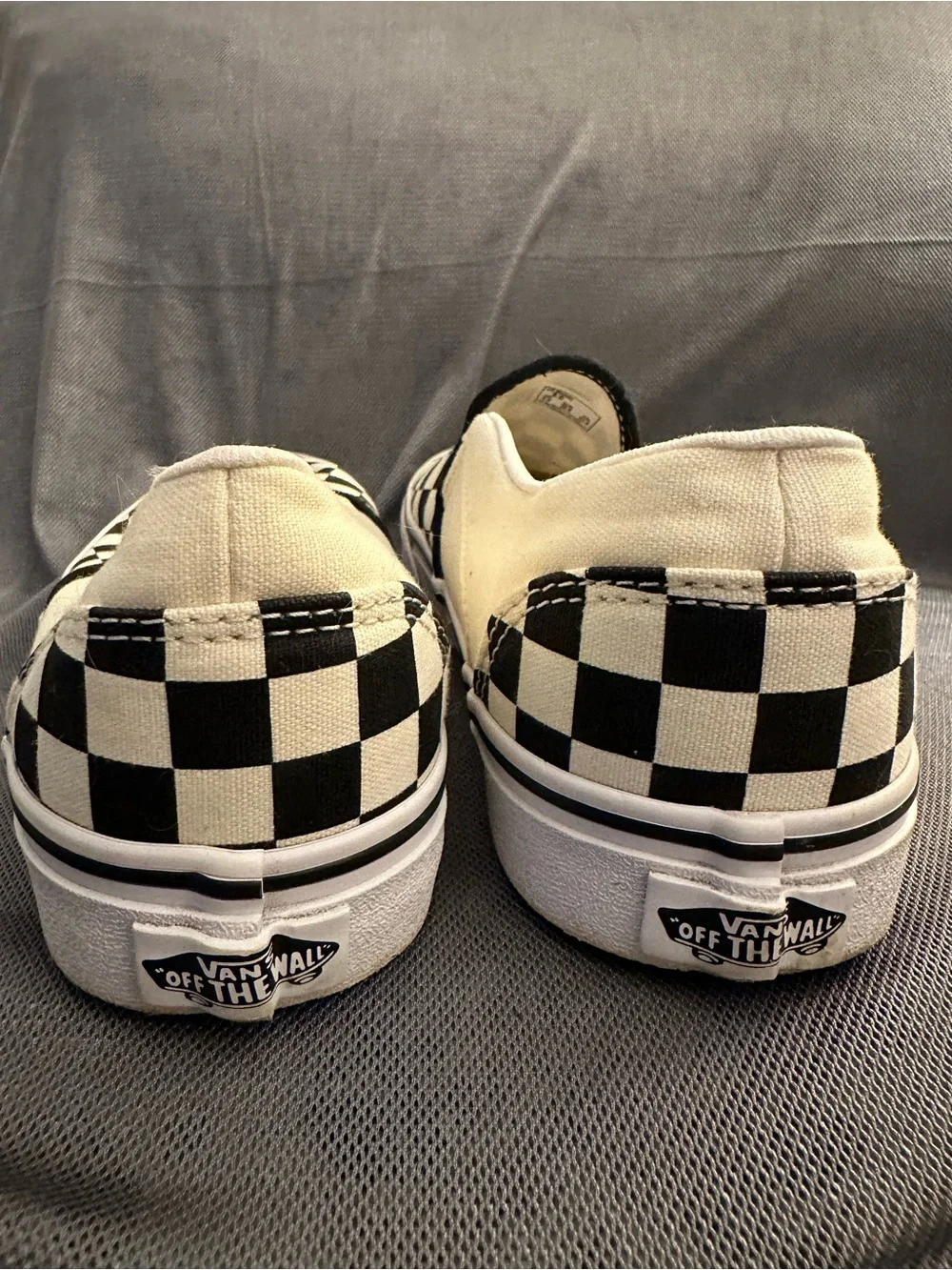 Vans Women's Black and White Checkerboard Slip-On Sneakers